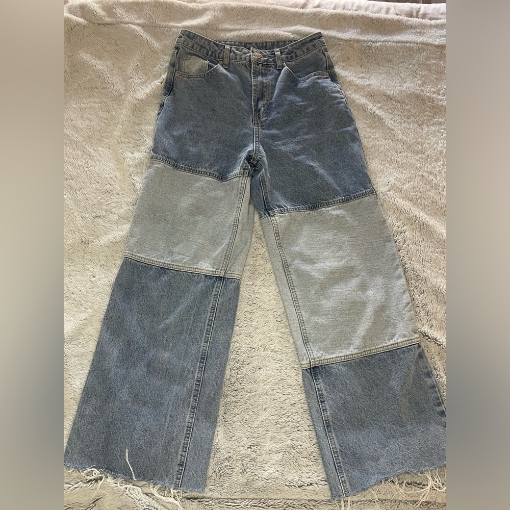 "Vintage Patchwork Frayed Jeans - Gently Worn, Distressed Style"